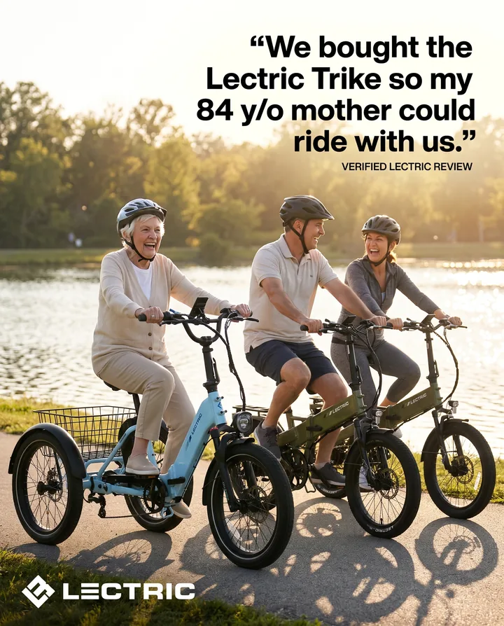 Spec ad for Lectric eBikes. An older woman rides a blue XP Trike 2 beside her son and his wife on a lakeside path, under the quote: We bought the Lectric Trike so my 84 y/o mother could ride with us.